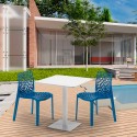 Vierkante salontafel wit 60x60 cm met stalen onderstel en 2 gekleurde stoelen Gruvyer Meringue Kosten