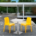 Vierkante salontafel wit 60x60 cm met stalen onderstel en 2 gekleurde stoelen Ice Hazelnut Karakteristieken