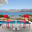 Ronde salontafel zwart 70x70 cm en 2 gekleurde stoelen Parisienne Cosmopolitan Voorraad