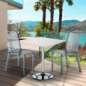Vierkante salontafel wit 70x70 cm met stalen onderstel en 2 transparante stoelen Dune Titanium Aanbod