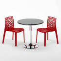 Ronde salontafel zwart 70x70 cm met stalen onderstel en 2 gekleurde stoelen Gruvyer Cosmopolitan 