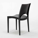 Vierkante salontafel zwart 70x70 cm met stalen onderstel en 2 gekleurde stoelen Paris Aia 