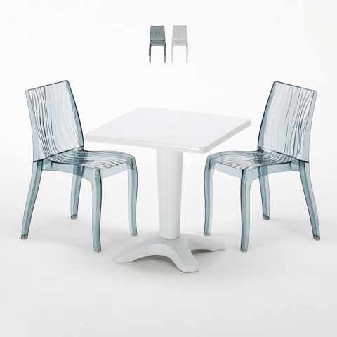 Vierkante salontafel wit 70x70 cm met stalen onderstel en 2 transparante stoelen Dune Terrace