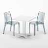 Vierkante salontafel wit 70x70 cm met stalen onderstel en 2 transparante stoelen Dune Terrace Korting