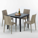 Vierkante zwarte salontafel 90x90 cm met 4 gekleurde stoelen Bistrot Passion Voorraad