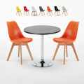 Ronde salontafel zwart 70x70 cm met stalen onderstel en 2 gekleurde stoelen Nordica Cosmopolitan Aanbieding