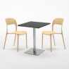 Vierkante tafel 60x60 cm Stalen onderstel en zwart top met 2 gekleurde stoelen Restaurant Pistachio Model