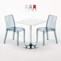 Vierkante salontafel wit 70x70 cm met stalen onderstel en 2 transparante stoelen Cristal Light Titanium Aanbod