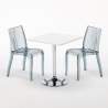 Vierkante salontafel wit 70x70 cm met stalen onderstel en 2 transparante stoelen Dune Titanium Korting