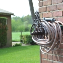 Klassieke decoratieve gietijzeren muurhaspel voor flexibele slang Verkoop