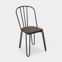 set rechthoekige tafel 120x60 met 4 design stoelen van hout en industrieel staal Lix magis 