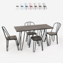set rechthoekige tafel 120x60 met 4 design stoelen van hout en industrieel staal magis 