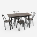 Industrieel set met rechthoekige tafel 120x60 en en 4 design stoelen van staal en hout Otis 