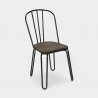 Industrieel set met rechthoekige tafel 120x60 en en 4 design stoelen van staal en hout Otis 
