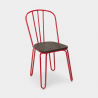 set rechthoekige tafel 120x60 met 4 design stoelen van industrieel staal en hout Lix otis 