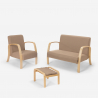 Scandinavische bank in de woonkamer van hout en stof, fauteuil, voetensteun Gyda Voorraad