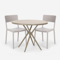 Set met 2 polypropyleen stoelen en ronde beige tafel 80x80 cm Aminos Aanbod