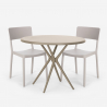 Set met 2 polypropyleen stoelen en ronde beige tafel 80x80 cm Aminos Aanbod