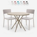 Set met 2 polypropyleen stoelen en ronde beige tafel 80x80 cm Aminos Aanbieding
