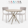 Set met 2 polypropyleen stoelen en ronde beige tafel 80x80 cm Aminos Aanbieding