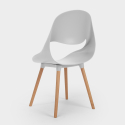 Set van 100 cm ronde zwarte tafel en 4 stoelen in Scandinavisch design Midlan Dark Kosten