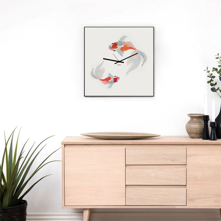 Japanse wandklok met modern design en Koi-vissen. Aanbieding