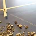 Wandklok zwart goud modern design minimaal rond Zwarte Maan Catalogus
