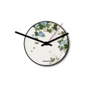 Kleine ronde wandklok met modern design, blauwe bloemen motief Aanbod